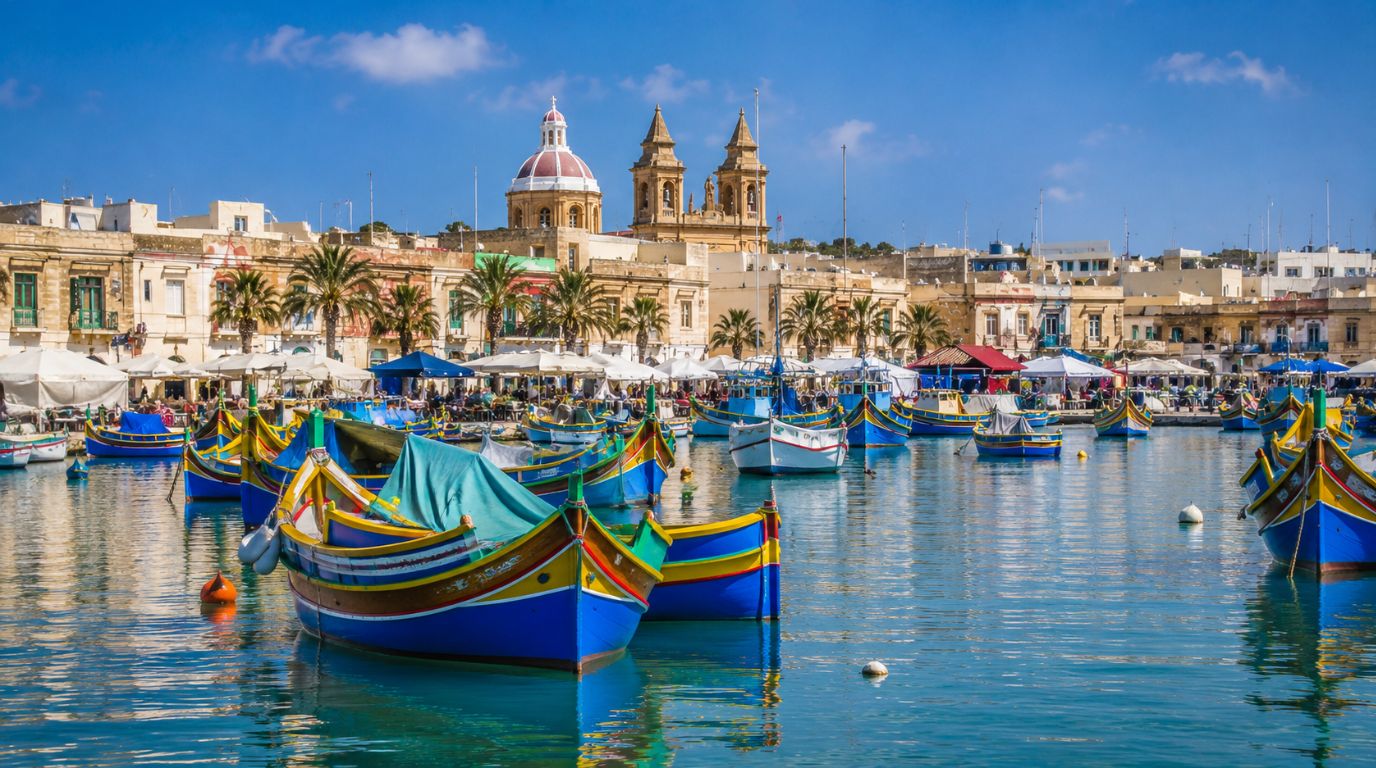 Marsaxlokk fishing village, Malta, with colorful luzzu boats in the harbour