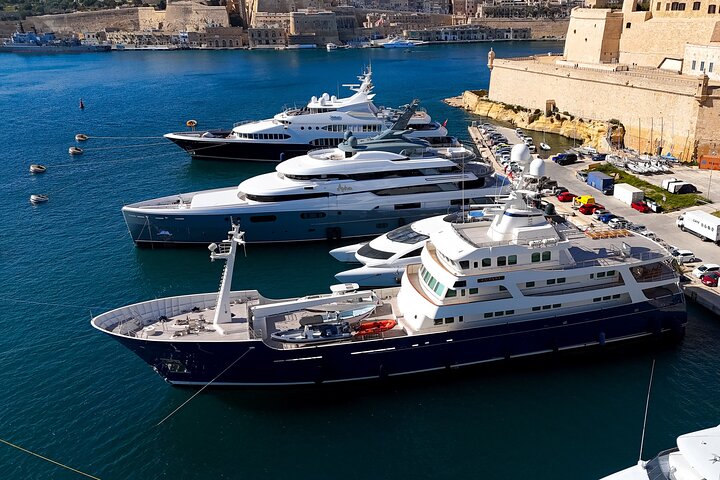 Luxury yachts in Grand Harbour between Valletta and the Three Cities