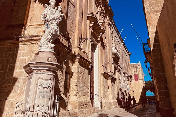 Historic street and statue in Mdina old city