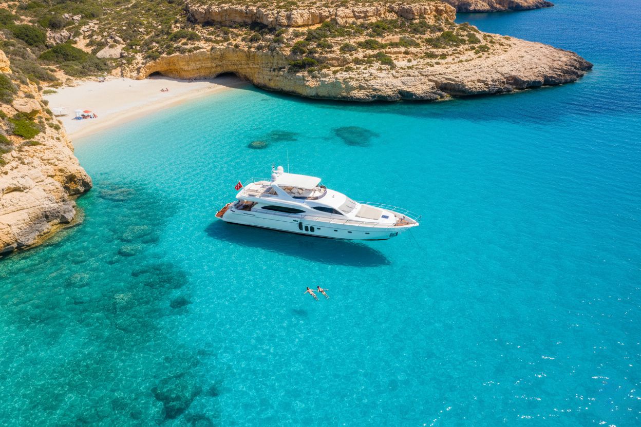 Yacht anchored near Comino’s turquoise cove representing secluded island escape